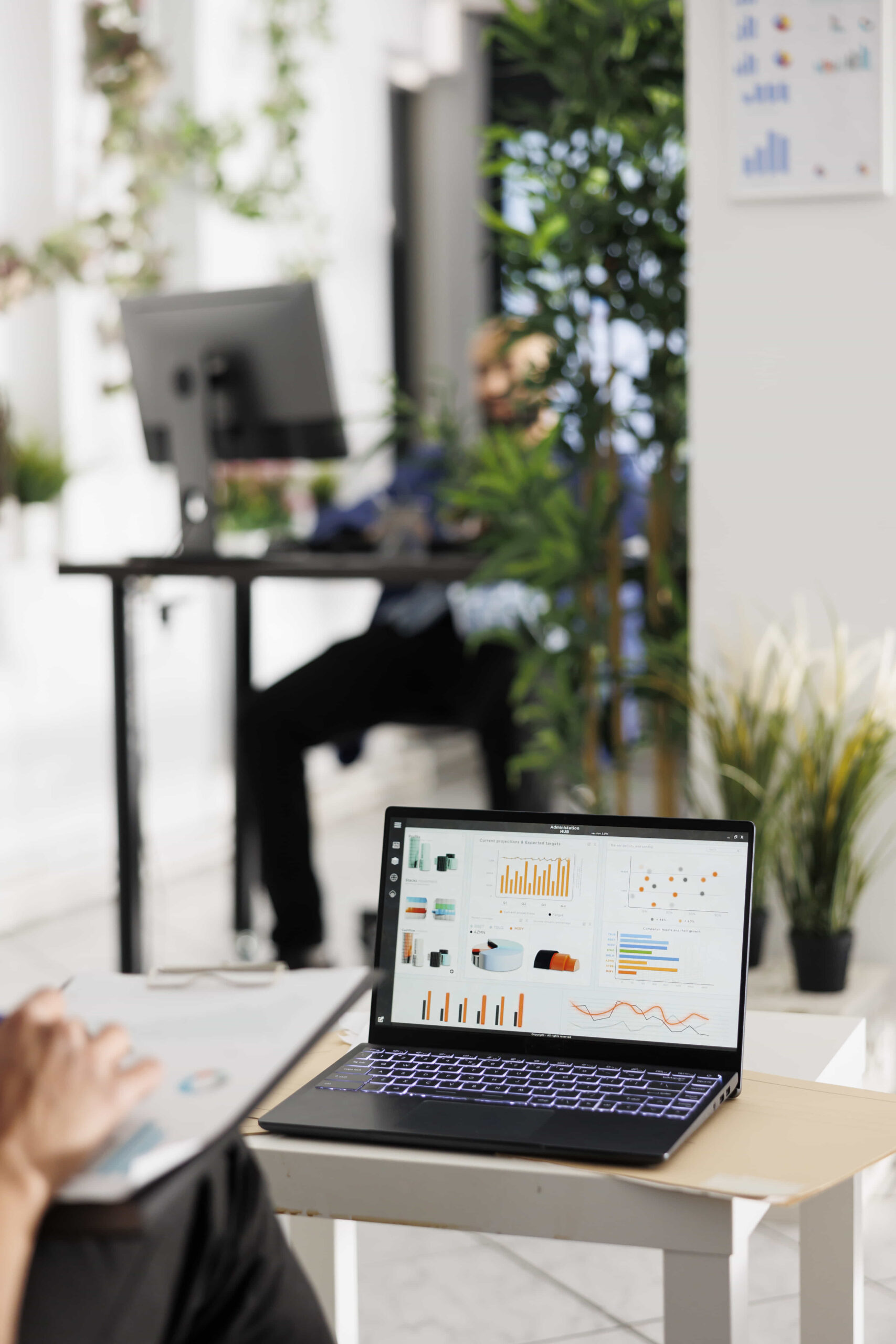 employee-reviewing-sales-data-laptop-screen-budgeting-strategy-business-office-worker-analyzing-metrics-statistics-charts-portable-computer-coworking-space